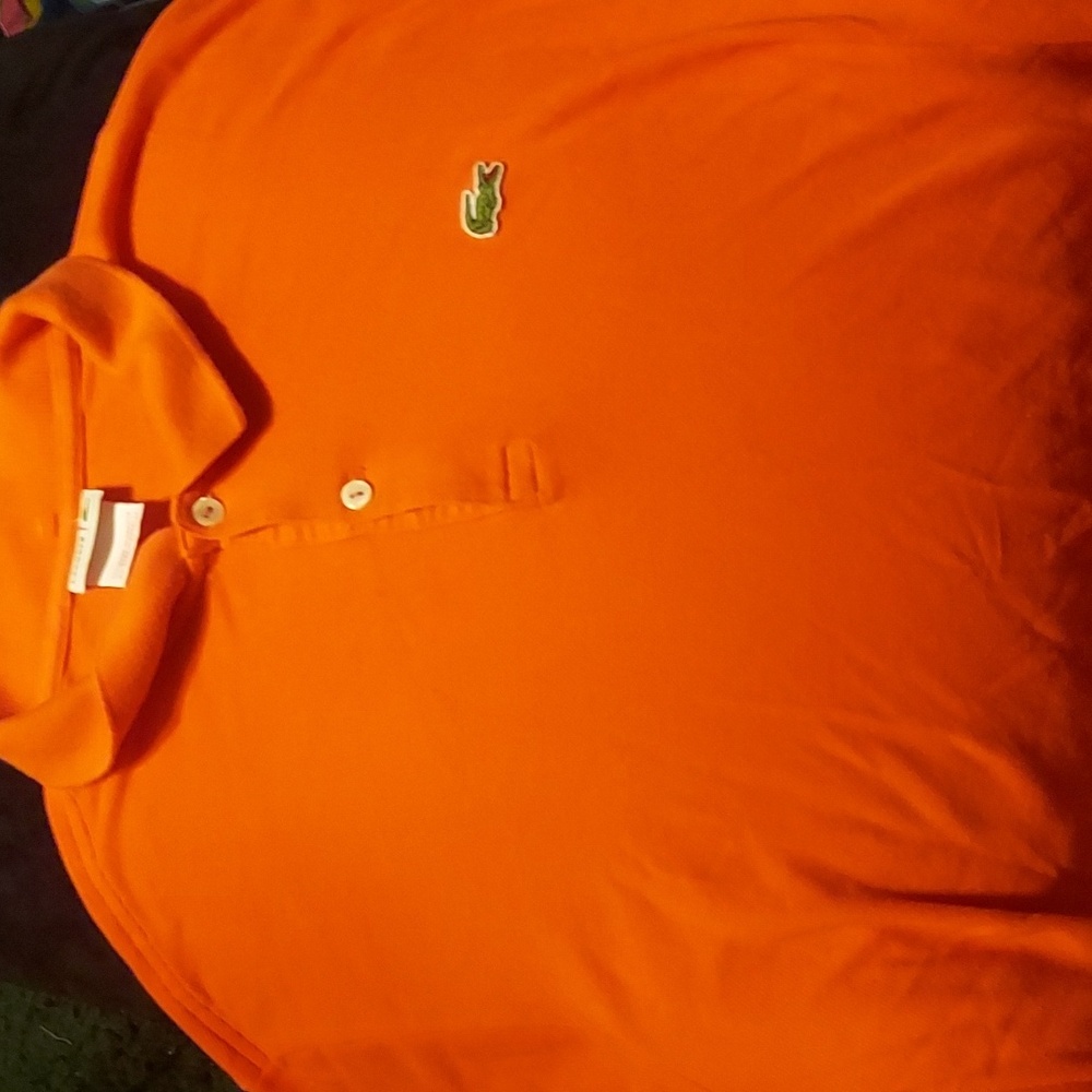 New School. Parisienne Street Ware. Lacoste Live Polo In Orange!